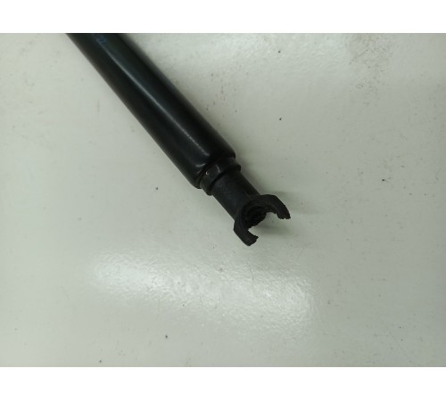 Амортизатор двери багажника левый