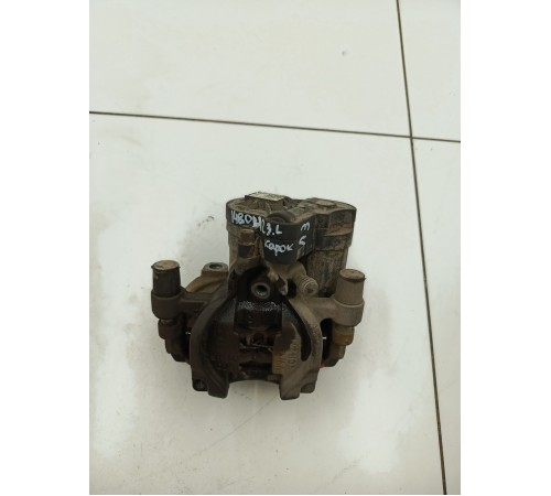 Суппорт тормозной задний левый