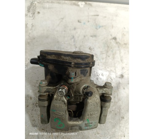 Суппорт тормозной задний левый