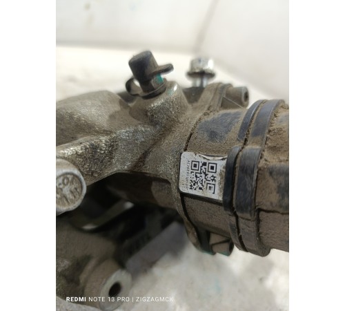 Суппорт тормозной задний левый