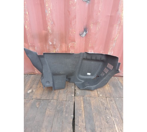 Обшивка багажника левая