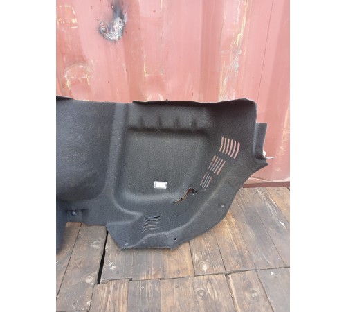 Обшивка багажника левая