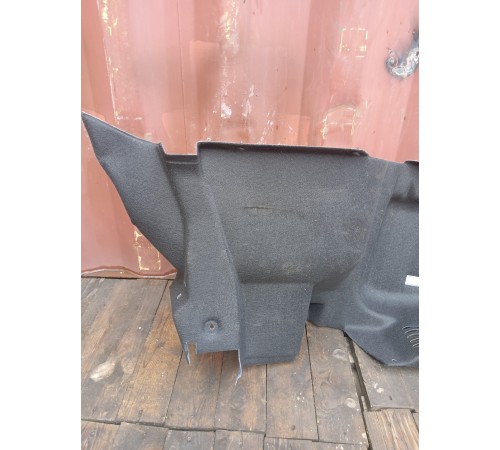 Обшивка багажника левая
