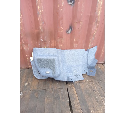 Обшивка багажника левая