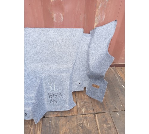 Обшивка багажника левая