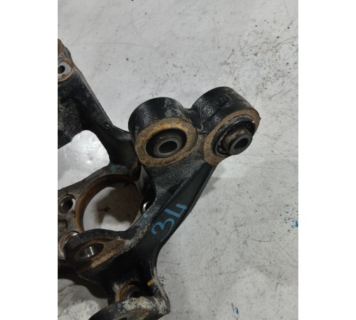 Кулак поворотный задний левый