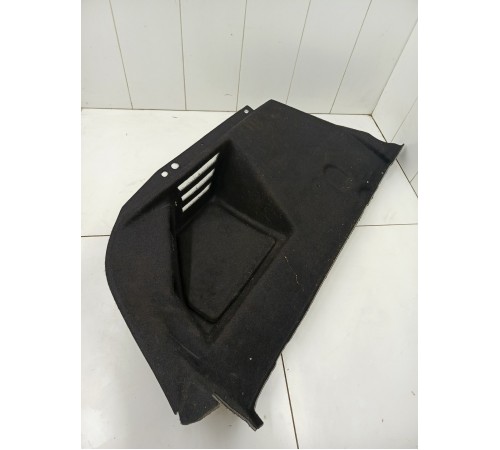 Обшивка багажника левая