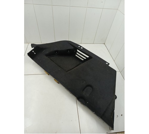 Обшивка багажника левая