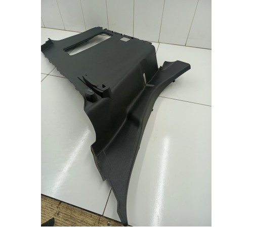 Обшивка багажника левая