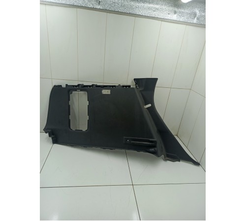 Обшивка багажника левая