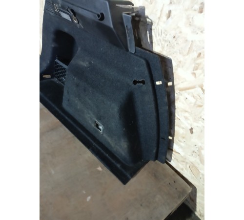 Обшивка багажника в сборе левая