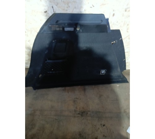 Обшивка багажника в сборе левая