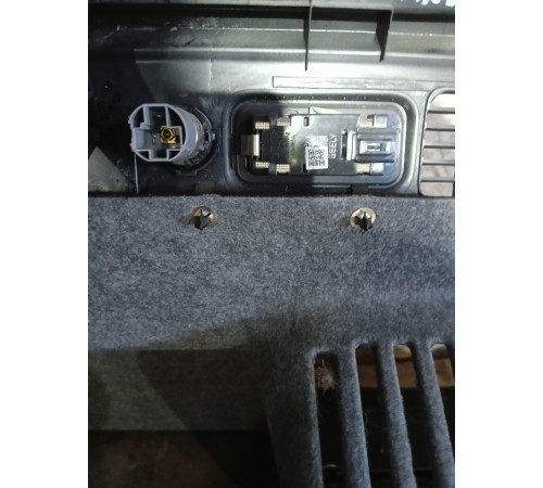 Обшивка багажника в сборе левая