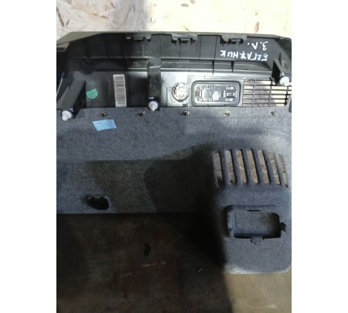 Обшивка багажника в сборе левая