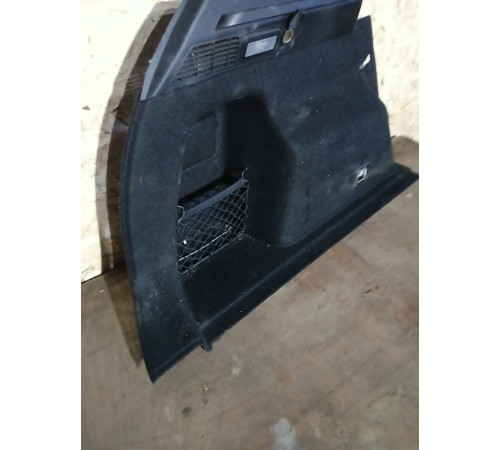 Обшивка багажника в сборе левая
