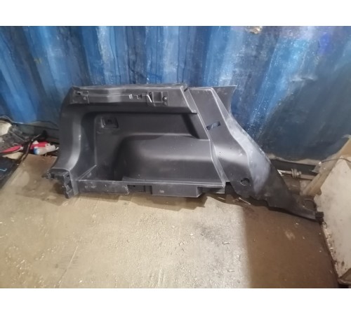 Обшивка багажника (левая)