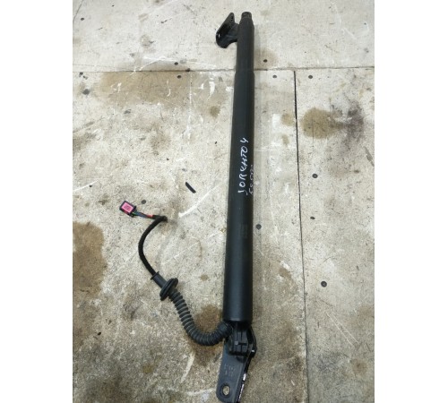 Амортизатор двери багажника левый