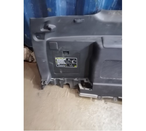 Обшивка багажника левая