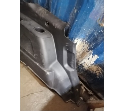 Обшивка багажника левая