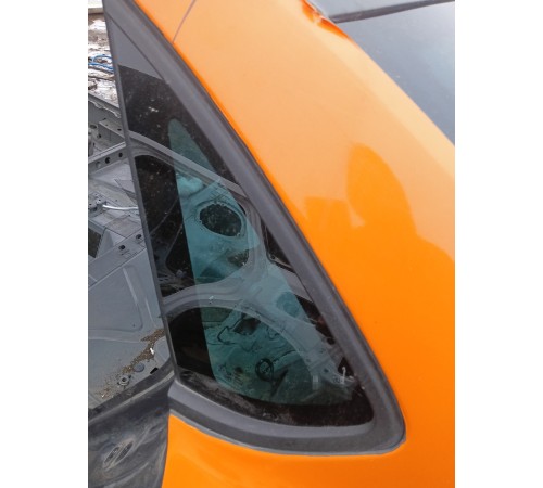 Глухое стекло заднее левое