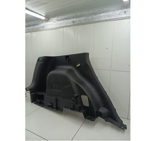 Обшивка багажника левая