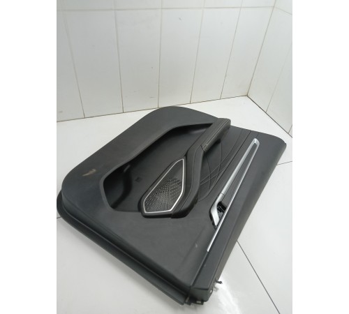 Обшивка двери передняя левая