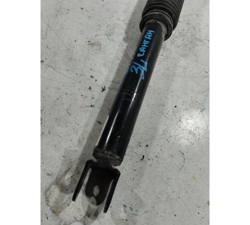 Амортизатор подвески задний левый