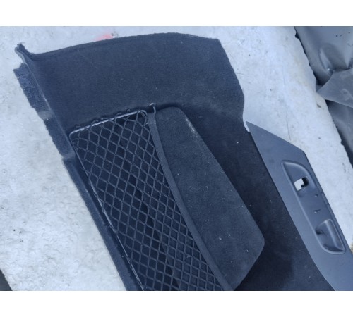 Обшивка багажника левая