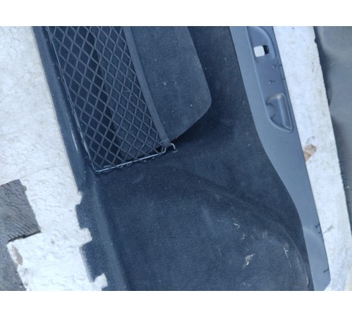 Обшивка багажника левая