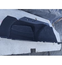 Обшивка багажника левая