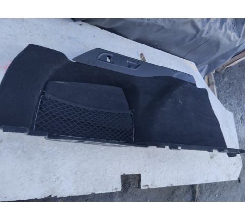 Обшивка багажника левая