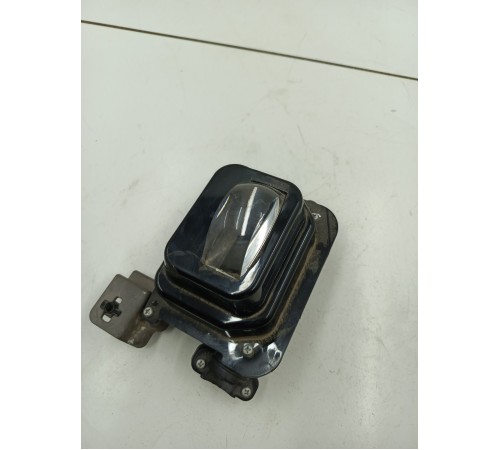 Линза фары левая