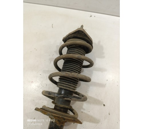 Амортизатор подвески передний левый в сборе