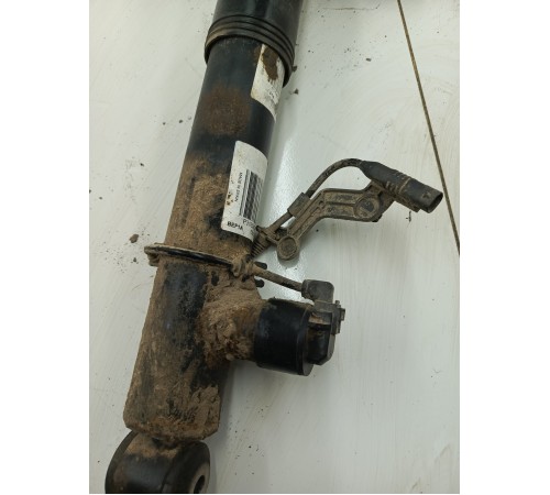 Амортизатор задний левый