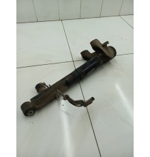 Амортизатор задний левый