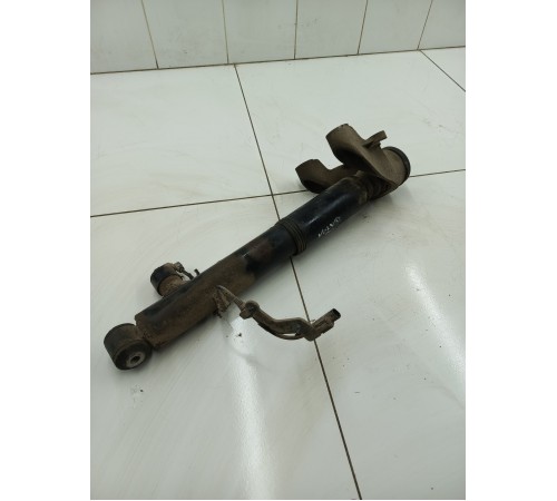 Амортизатор задний левый