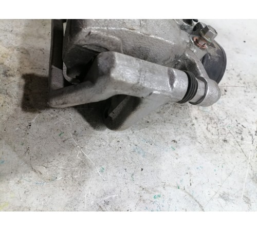 Суппорт тормозной задний левый