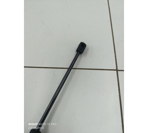 Амортизатор багажника левый