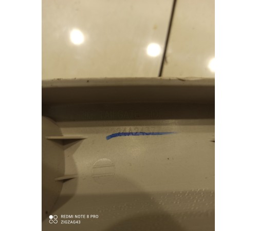 Обшивка двери багажника (левая)