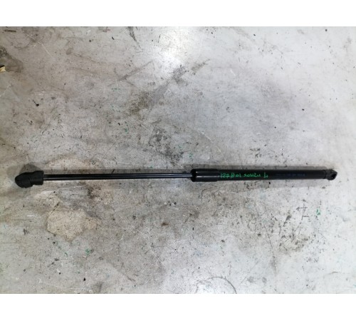 Амортизатор крышки багажника левый