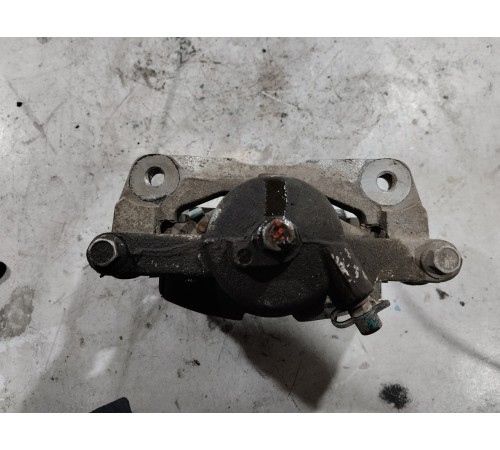 Суппорт тормозной передний левый