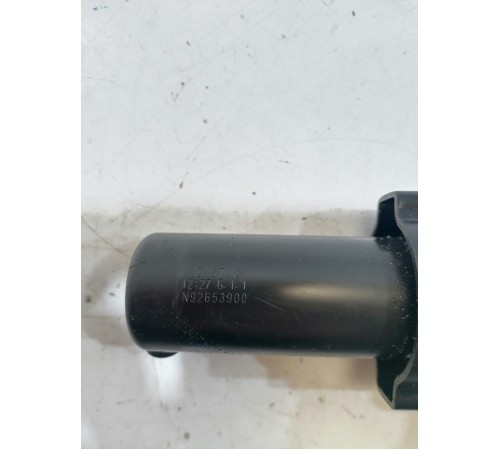 Форсунка омывателя фар левая