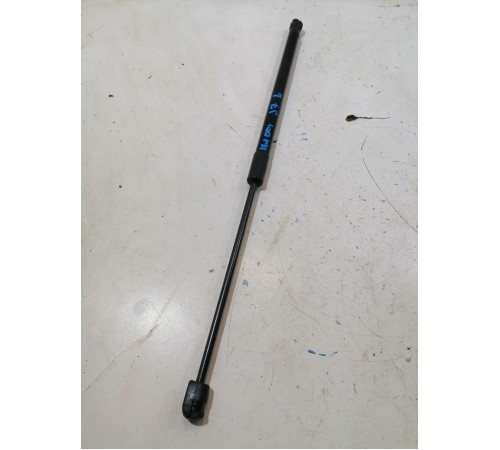 Амортизатор двери крышки багажника левый