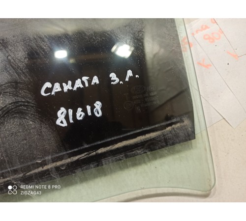 Стекло двери (заднее левое)