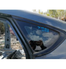 Глухое стекло кузова левое