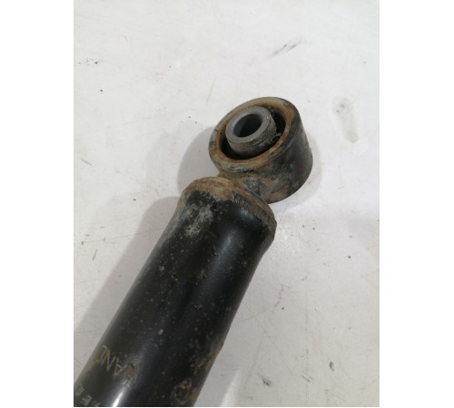 Амортизатор задний левый