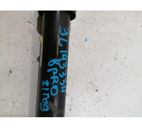 Амортизатор задний левый