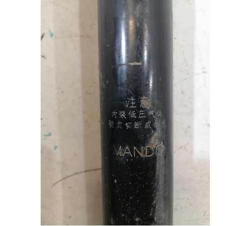 Амортизатор задний левый