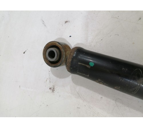 Амортизатор задний левый