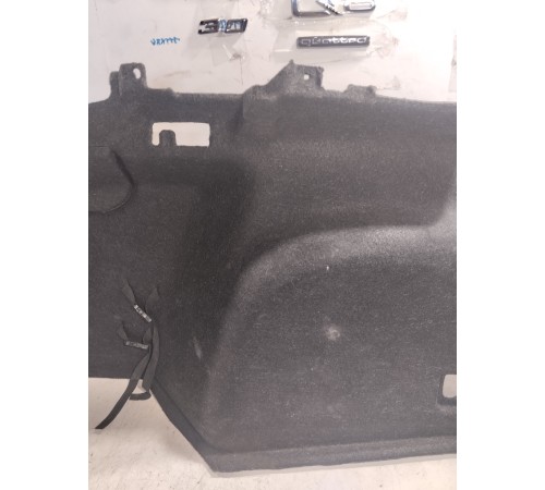 Обшивка багажника левая